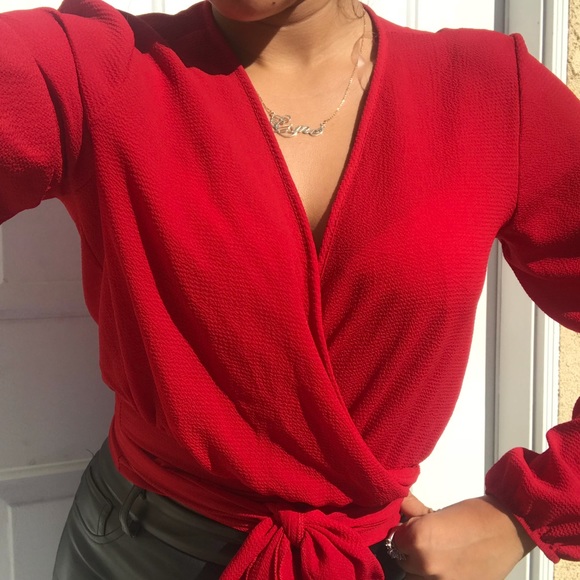 Red top with tie on the front. - Picture 3 of 6